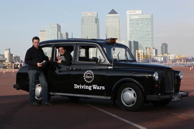 Dr James Brighton and Colin Murray with remote controlled black cab-1.jpg